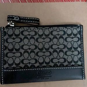 Coach gently used small wallet.  Black/signature